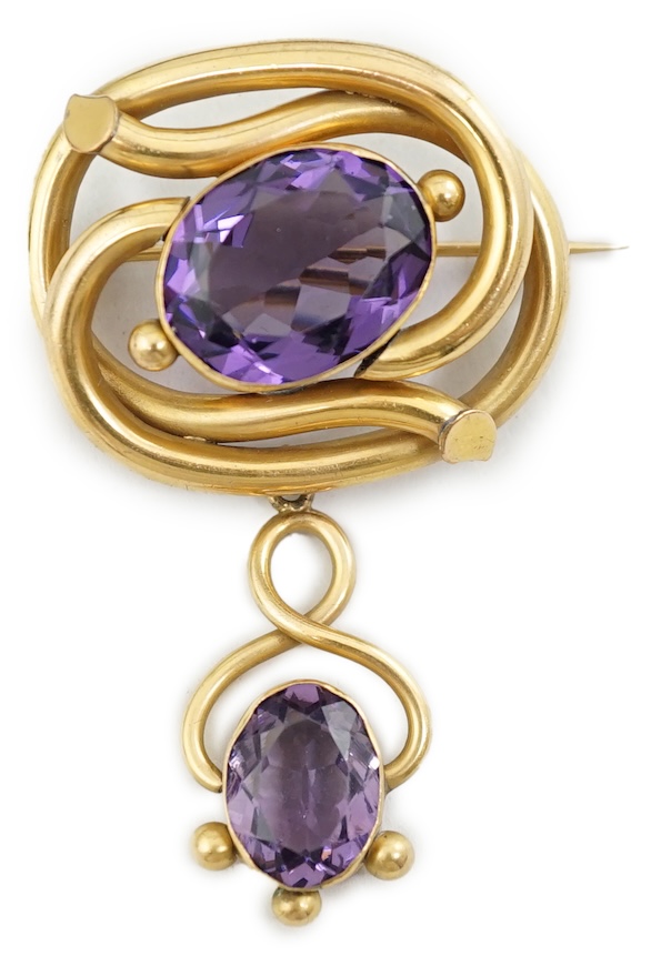 A Victorian gilt metal and two stone amethyst set drop brooch